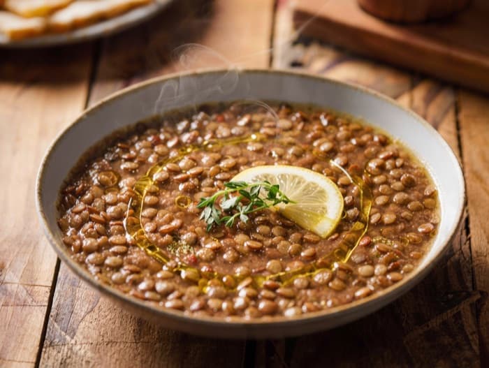 Brown Lentil Soup with Lemon, plated and ready to serve