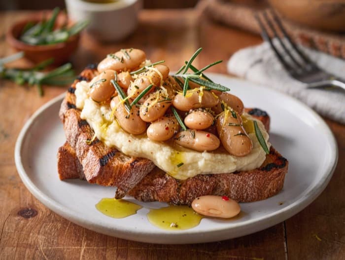 Rosemary White Beans on Garlic Toast, plated and ready to serve