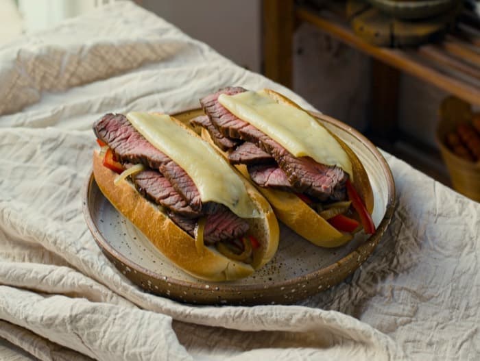 Steak and Pepper Cheese Subs, plated and ready to serve