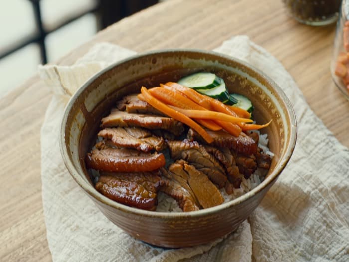 Caramelized Pork Rice Bowls with Pickled Carrot, plated and ready to serve