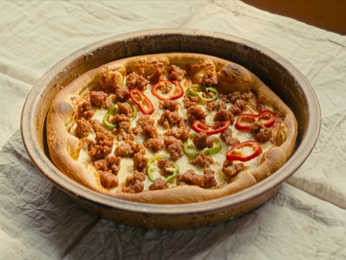 Sausage and Pepper Sheet Pan Pizza, plated and ready to serve