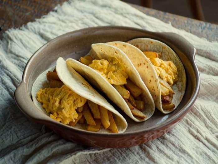 Cheesy Egg and Potato Breakfast Tacos, plated and ready to serve