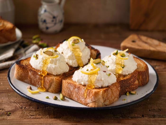 Whipped Ricotta and Honey Breakfast Toast, plated and ready to serve