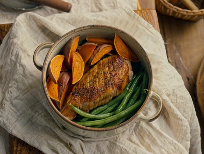 Sheet-Pan Pork Tenderloin with Sweet Potatoes, plated and ready to serve