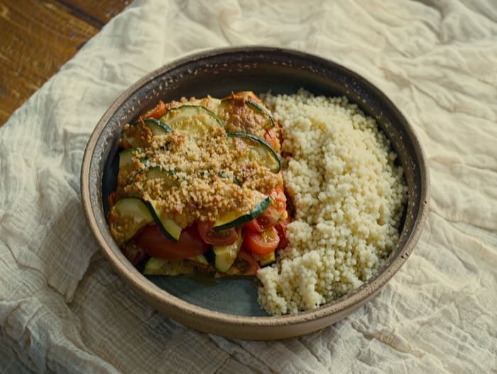 Zucchini and Tomato Gratin with Couscous, plated and ready to serve